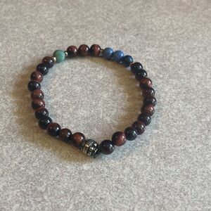 Hide Away Red Tiger Eye: Elegant Brown and Blue Beaded Bracelet